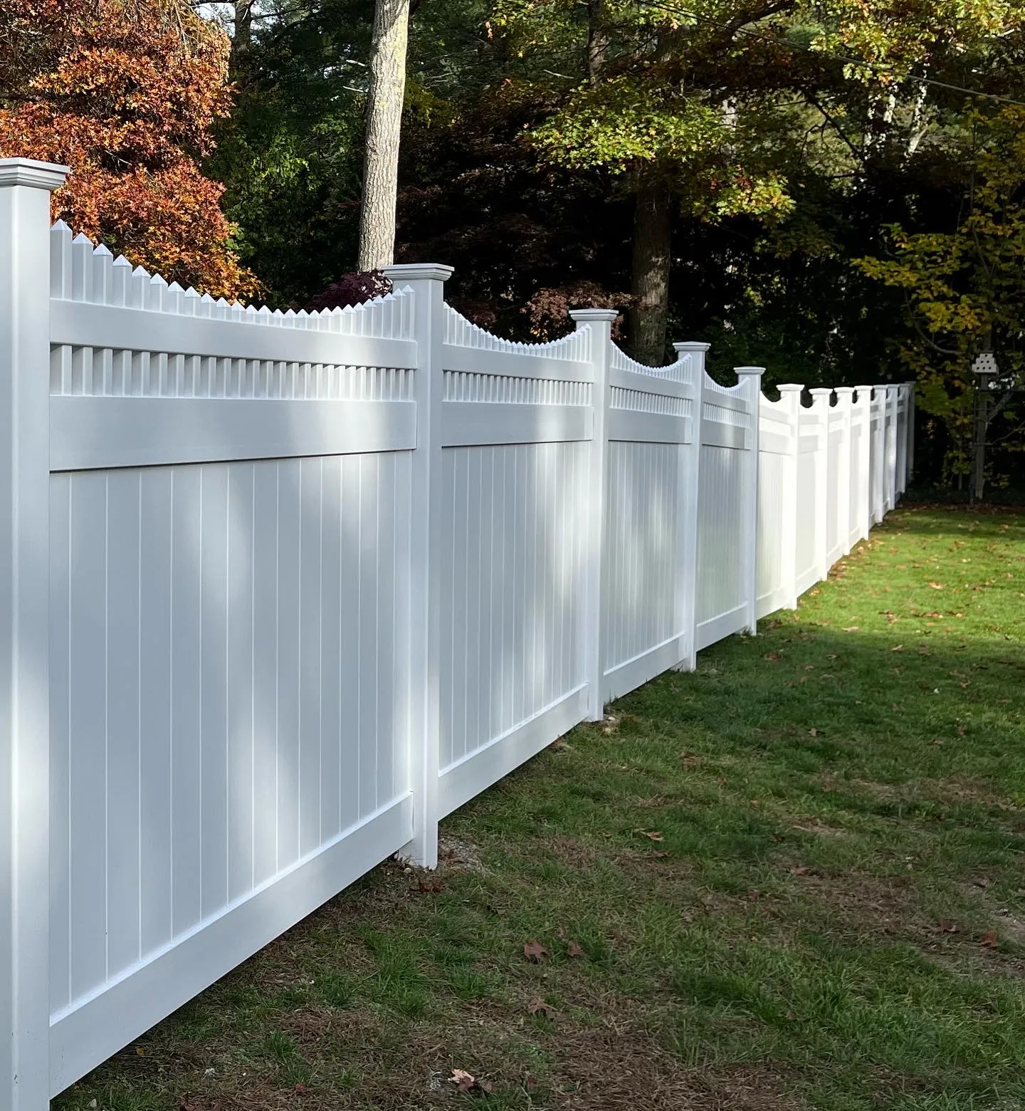 Vinyl fence installation near backyard