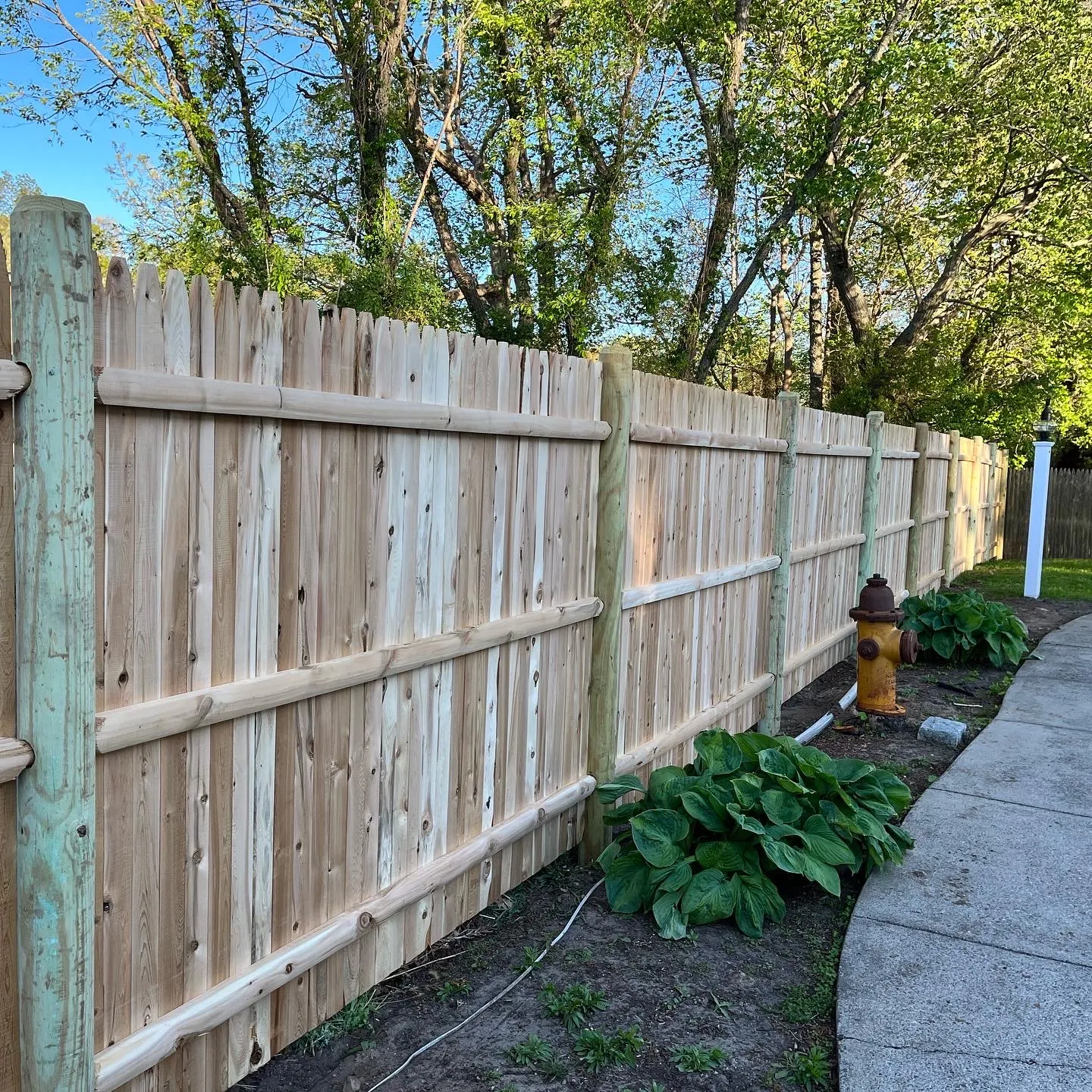 Wood fence installation project 8