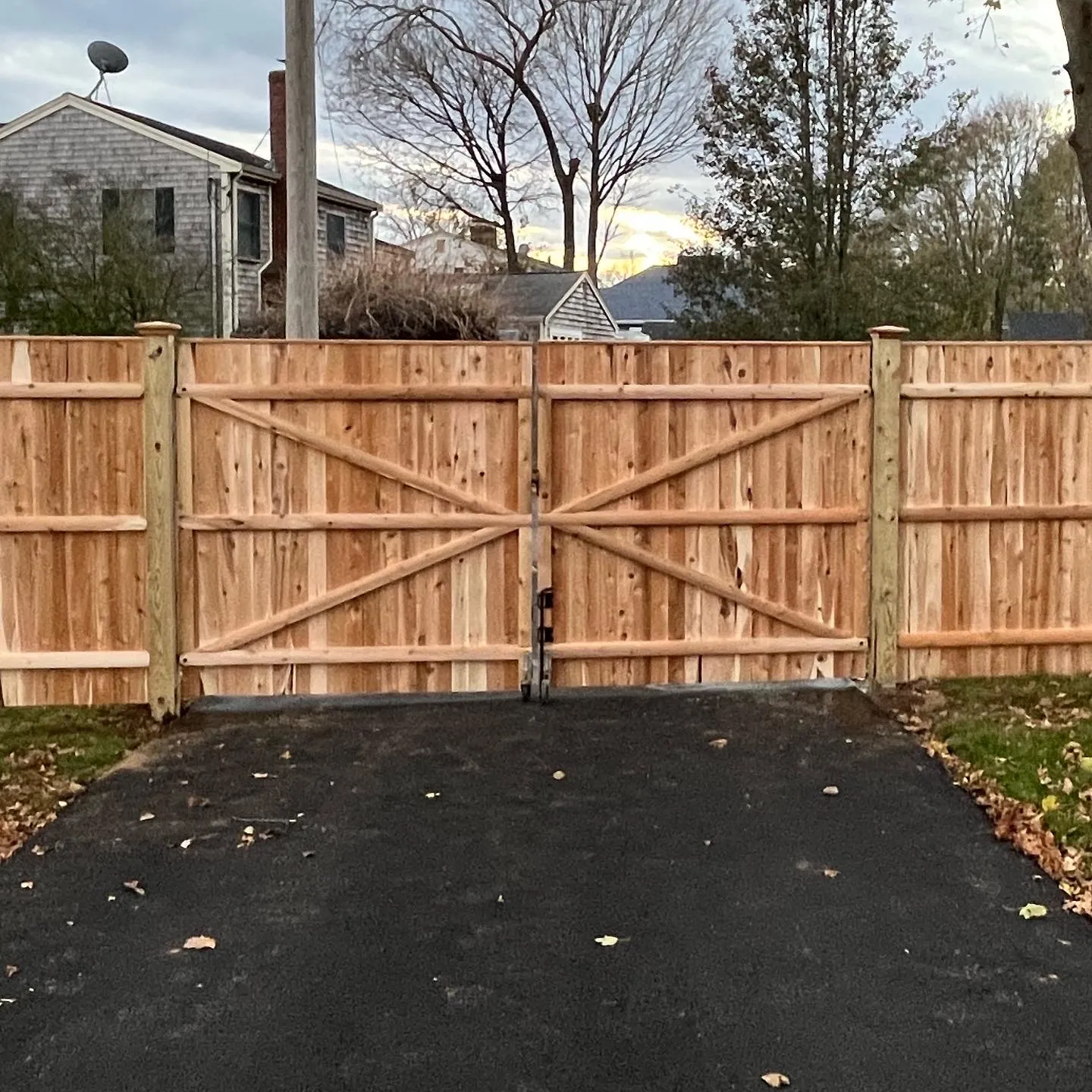 Wood fence installation near backyard