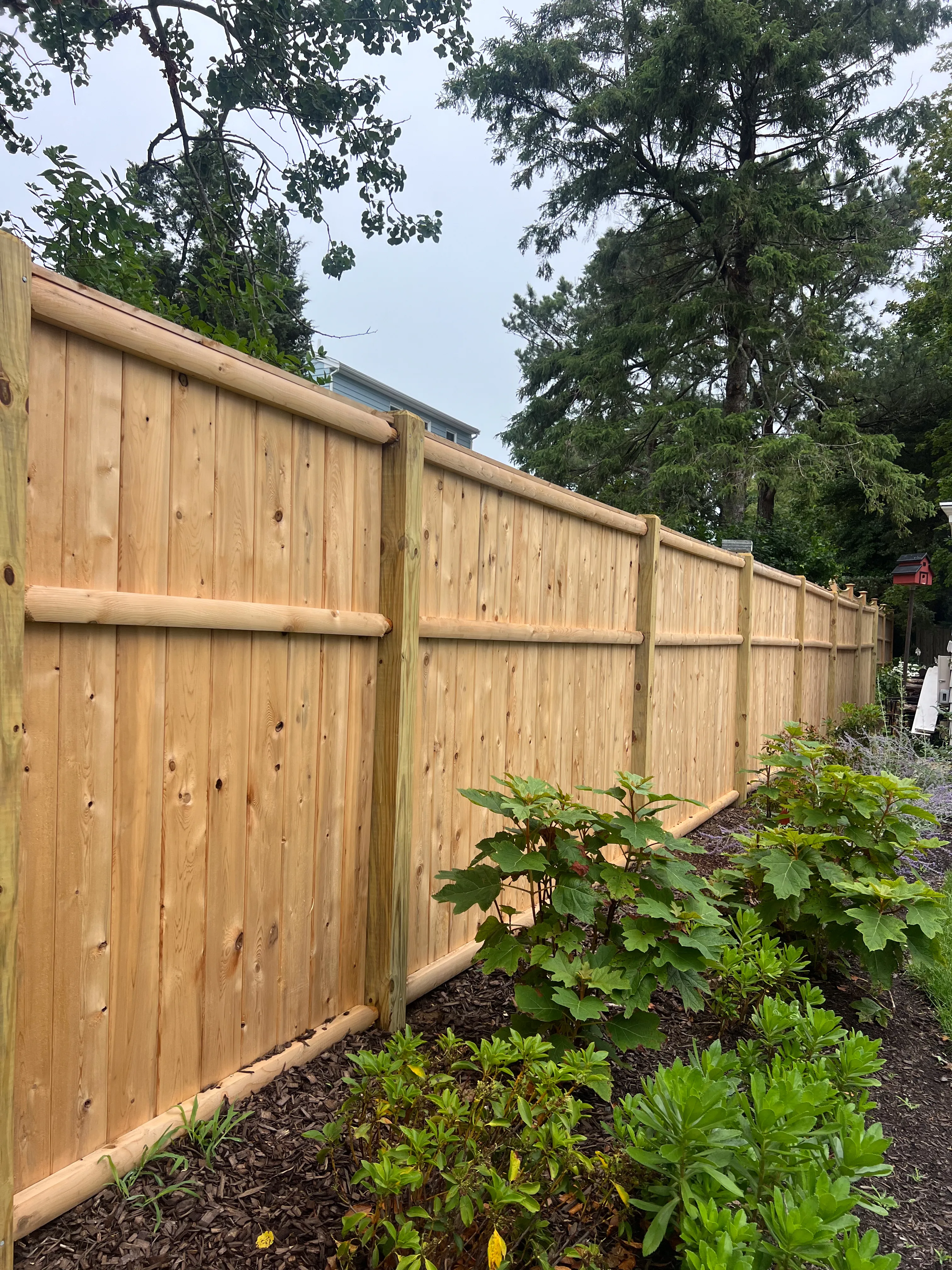 Wood fence installation project 14