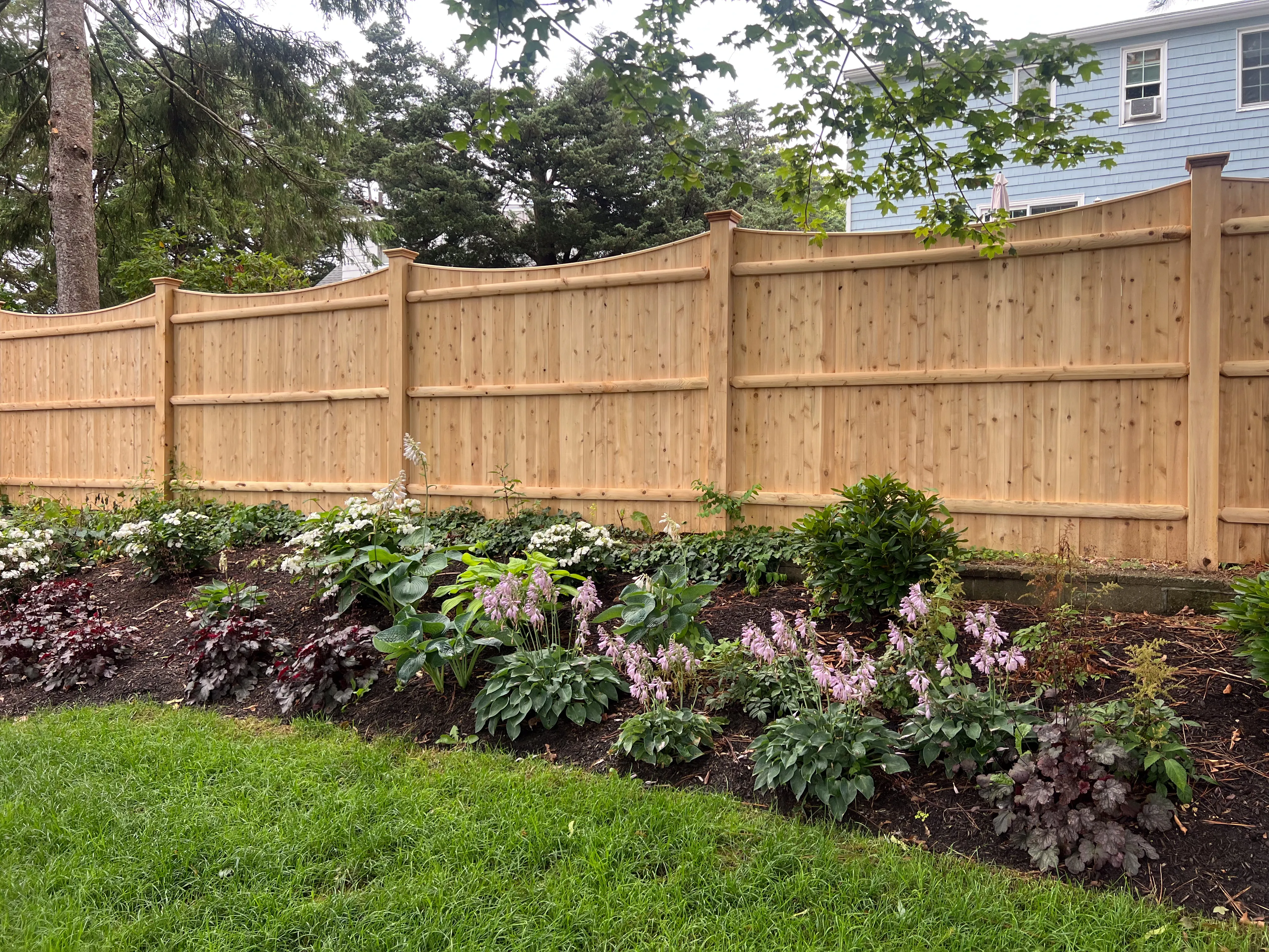 Wood fence installation project 15