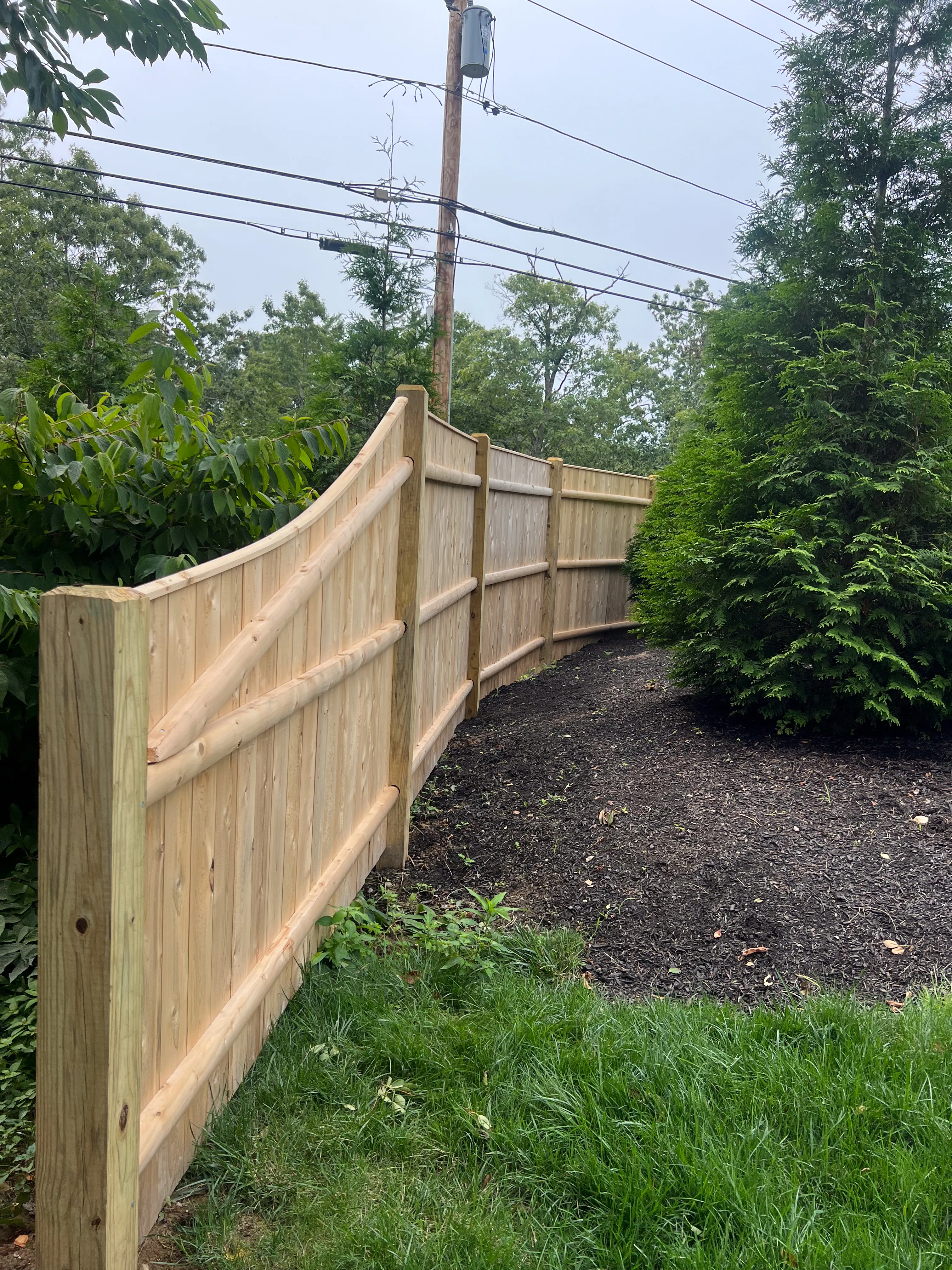Wood fence installation project 18